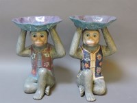 Lot 156 - A pair of Chinese design pottery monkey stands