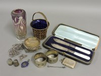 Lot 44 - A silver basket with a blue glass liner