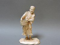 Lot 90 - A Japanese ivory sectional figure