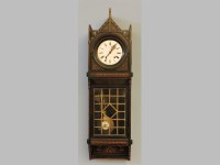 Lot 212 - An early 20th century ebonised wall hanging clock