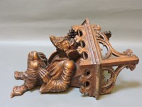 Lot 309 - A French carved walnut bracket