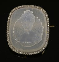 Lot 321 - A moonstone cameo brooch