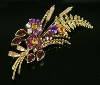 Lot 471 - A gem set two-colour gold spray brooch