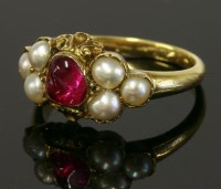 Lot 333 - A Victorian ruby and split pearl ring