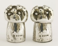 Lot 233 - A pair of novelty silver peppers
