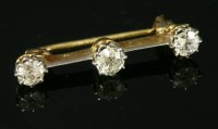 Lot 348 - A cased late Victorian three stone diamond bar brooch or cravat pin