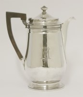 Lot 56 - A George III silver hot water jug