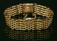 Lot 370 - A five-row gold gate bracelet