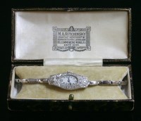 Lot 404 - A ladies' Art Deco diamond set mechanical cocktail watch