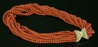 Lot 440 - An eleven-row coral torsade necklace