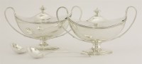 Lot 143 - A pair of George III silver two-handled sauce tureens and covers