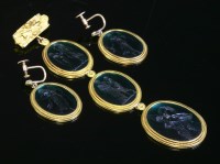 Lot 301 - Five green glass intaglio plaques