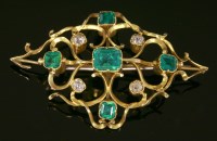 Lot 317 - A lozenge-shaped emerald and diamond brooch