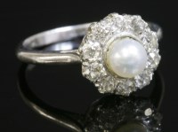 Lot 354 - A pearl and diamond circular cluster ring