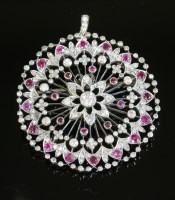 Lot 428 - A Belle Époque diamond and ruby floral cluster pendant brooch