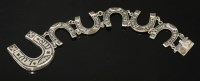 Lot 300 - A Russian silver and niello enamel horseshoe bracelet