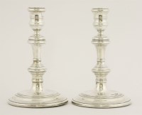 Lot 167 - A pair of silver candlesticks