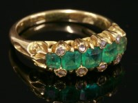 Lot 320 - A Victorian five stone emerald and diamond ring