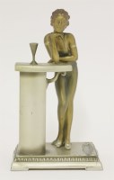 Lot 179 - An Art Deco patinated table lighter