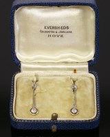 Lot 401 - A Continental pair of Art Deco diamond set drop earrings