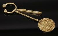 Lot 443 - A 9ct gold key chain by Kurt Weiss