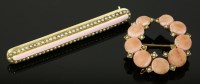 Lot 373 - An American enamel and split pearl gold bar brooch