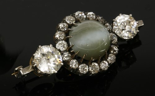 Lot 345 - A late Victorian chrysoberyl cat's-eye and diamond cluster