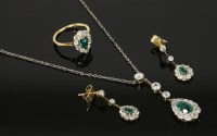 Lot 421 - An emerald and diamond matched pendant