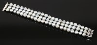 Lot 492 - A three-row uniform cultured pearl bracelet