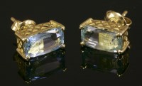 Lot 504 - A pair of 14ct gold single stone aquamarine stud earrings