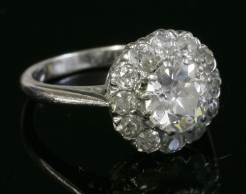 Lot 397 - A white gold diamond set cluster ring
