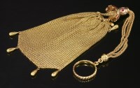 Lot 273 - A Victorian ruby and diamond set gold miser's purse