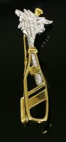 Lot 528 - An 18ct yellow and white gold diamond set popped champagne stick pin