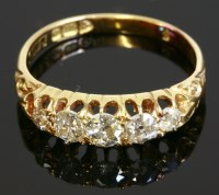 Lot 335 - An 18ct gold Edwardian five stone diamond boat-shaped ring