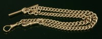 Lot 600 - A 9ct gold curb link double albert chain