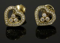 Lot 513 - A pair of Chopard 'Happy Diamonds' heart-shaped gold earrings