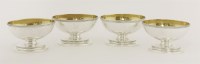 Lot 173 - A set of four George III silver salts
