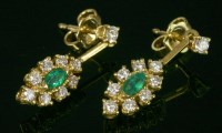 Lot 534 - A pair of emerald and diamond gold drop earrings