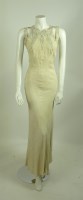 Lot 349 - A 1930s cream silk evening dress