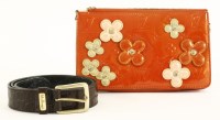 Lot 415 - A Louis Vuitton Vernis 'Lexington' flower day clutch bag