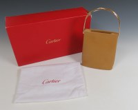 Lot 471 - A Cartier tan tricolour trinity handle bag