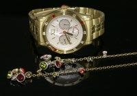 Lot 50 - A ladies' gold-plated Ted Baker 'Time is of the Essence' TE6067 quartz bracelet watch.  
mother-of-pearl dial