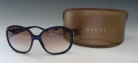 Lot 69 - A pair of Gucci sunglasses