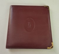 Lot 474 - A Cartier blood red leather wallet