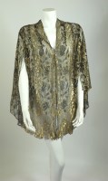 Lot 348 - A 1920s black tulle and gold lamé evening jacket
