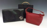 Lot 472 - A Coach red leather small evening handbag