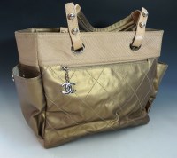 Lot 399 - A Chanel bronze quilted leather and canvas tote shopper