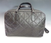 Lot 404 - A Chanel black lambskin leather metallic stitched tote shopper