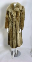 Lot 340 - A wolf fur full-length coat