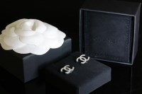 Lot 7 - A pair of cased Chanel paste set interlocking 'CC' logo earrings
